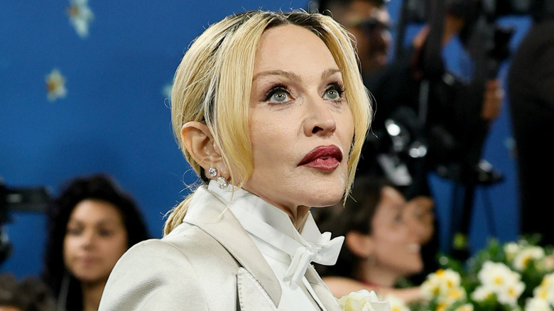 Ray of Light singer Madonna wearing a white tux on the red carpet