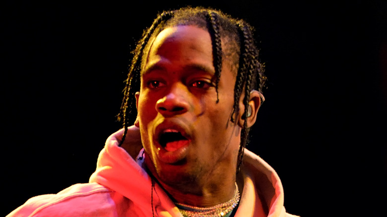 Travis Scott looking shocked  with mouth open