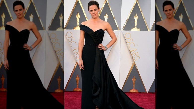 Jennifer Garner attending the Academy Awards in a black Versace dress