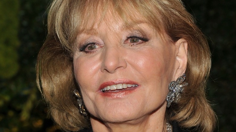 Barbara Walters half smiling