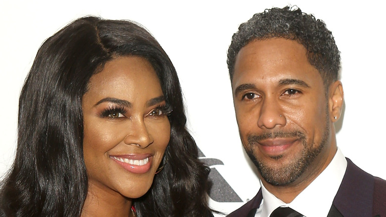 Kenya Moore Marc Daly smile red carpet