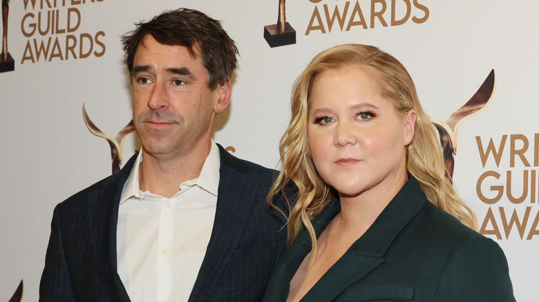 Amy Schumer and Chris Fischer posing