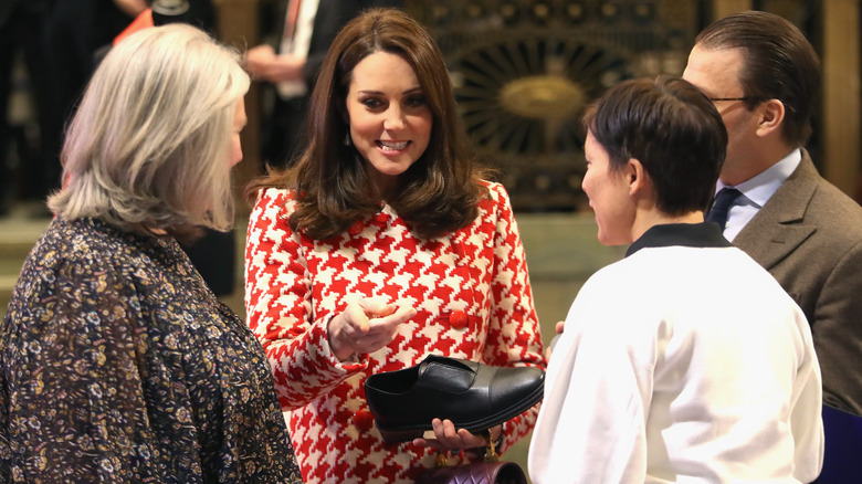Kate Middleton looks at shoes at a Swedish department store