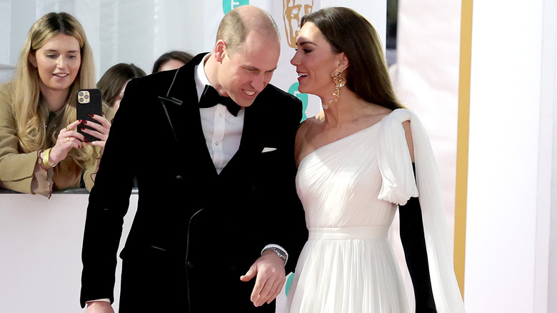 Kate Middleton whispers to Prince William 