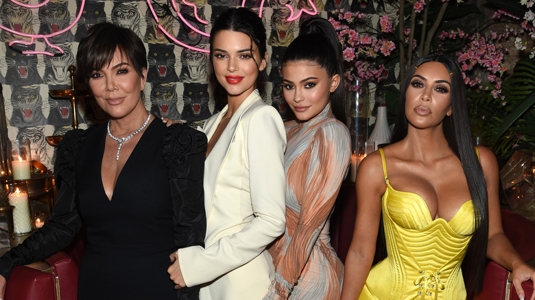 Kris, Kendall, Kylie, and Kim posing together