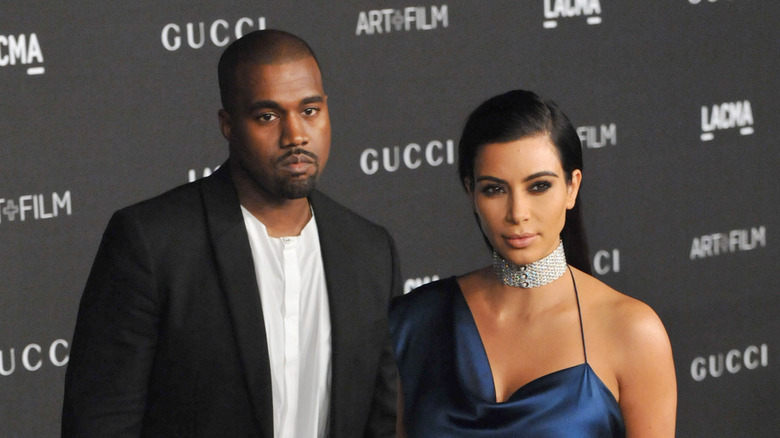 Kim Kardashian and Kanye West posing together