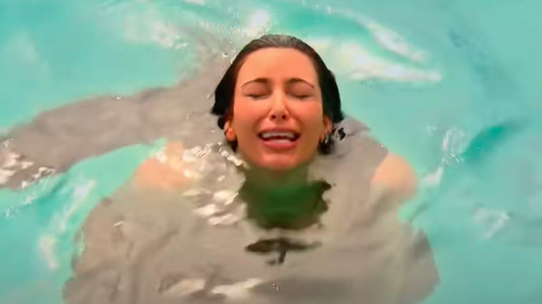 Kim Kardashian crying in the ocean