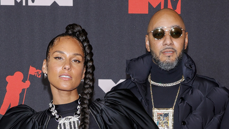 Alicia Keys and Swizz Beatz posing for a picture