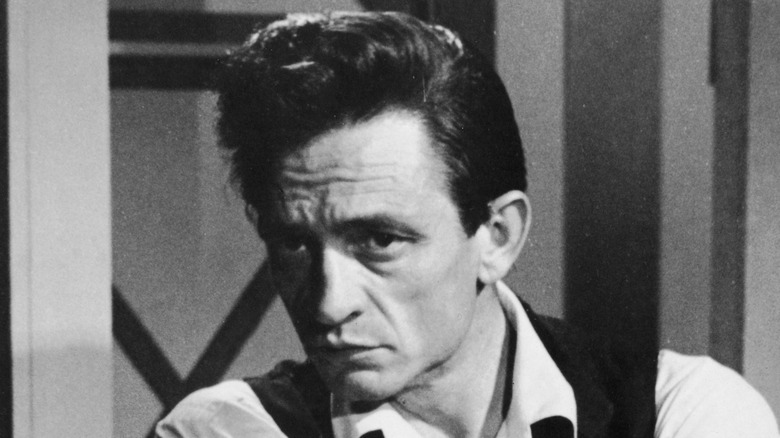 Johnny Cash posing for a photo