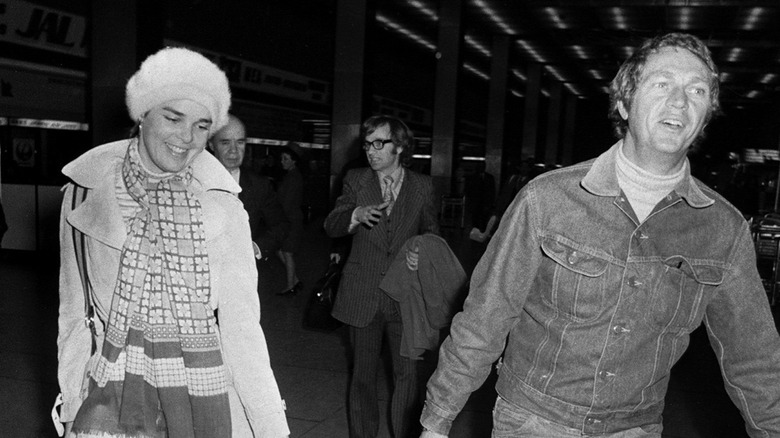 Ali MacGraw and Steve McQueen walking