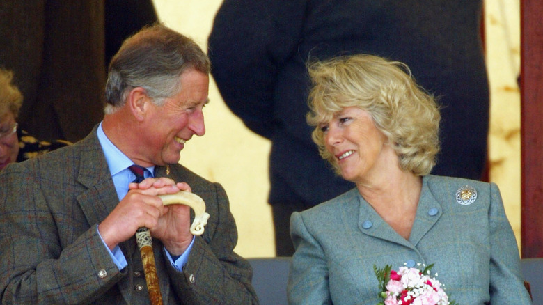Prince Charles smiling at Camilla Parker Bowles