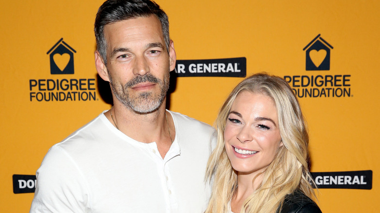 LeAnn Rimes and Eddie Cibrian posing