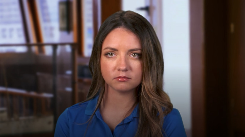 Laura Bileskalne blue shirt