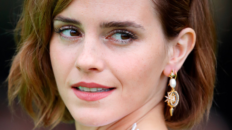 Emma Watson posing at an event