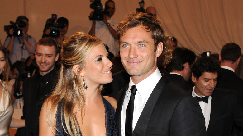 Sienna Miller gazing at Jude Law