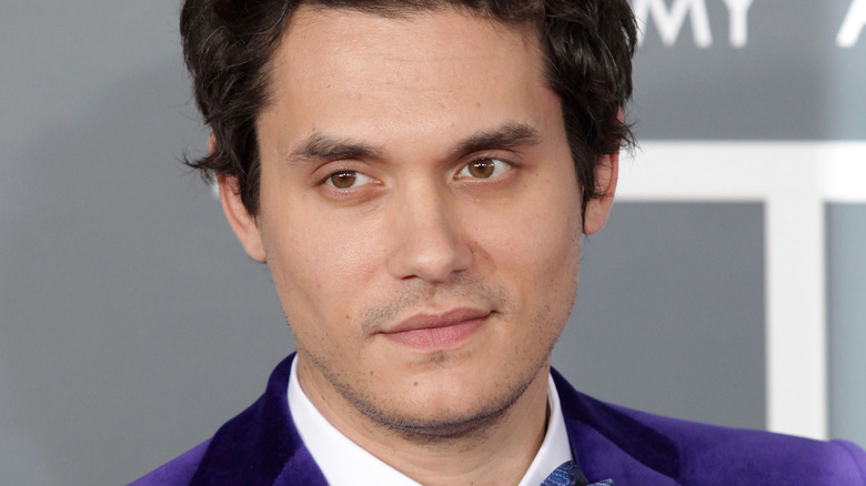 John Mayer smirking