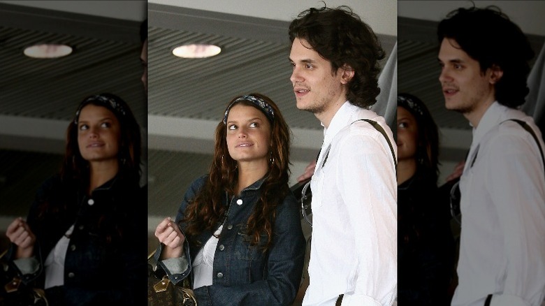 Jessica Simpson looking up at John Mayer