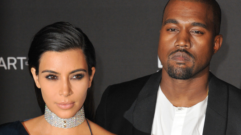 Kim Kardashian and Kanye West posing together