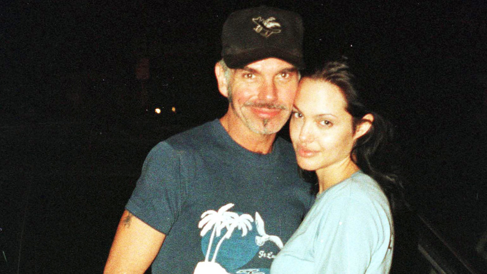Angelina Jolie and Billy Bob Thornton embracing and posing for camera