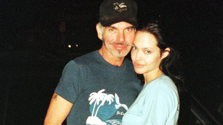 Angelina Jolie and Billy Bob Thornton embracing and posing for camera