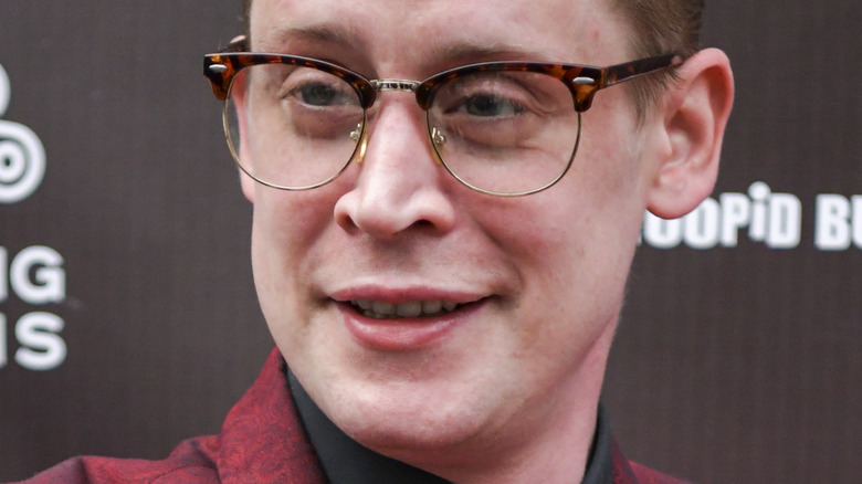 Macaulay Culkin smiling