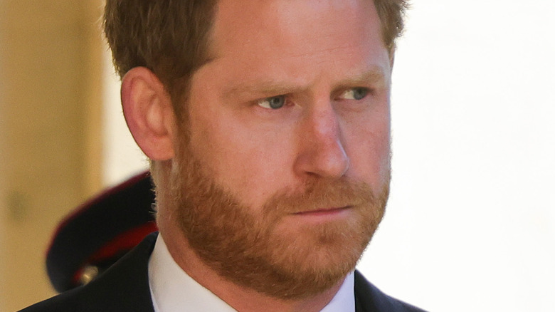 Prince Harry attending the funeral of Prince Philip