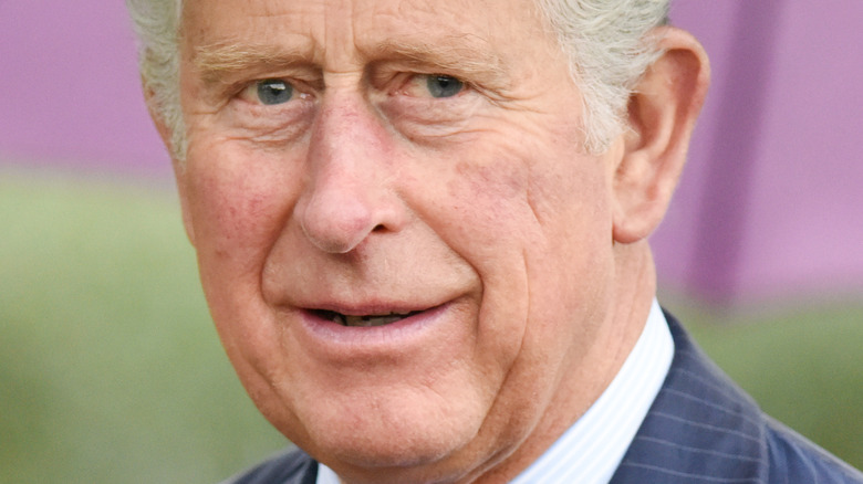 Prince Charles grimacing
