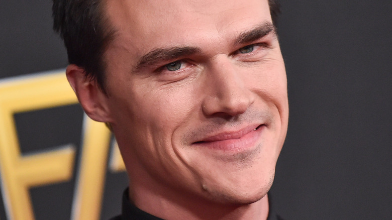 Finn Wittrock posing