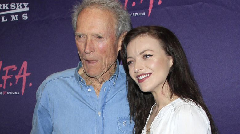 Clint Eastwood and Francesca Eastwood pose together in 2017