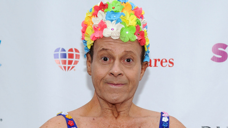 Richard Simmons in floral hat