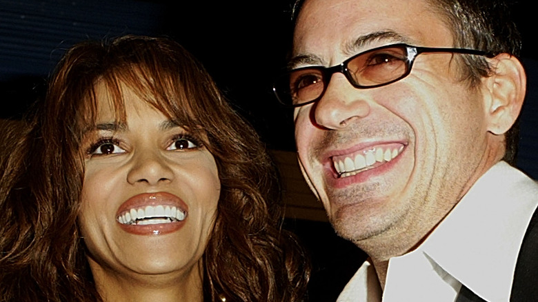 Halle Berry and Robert Downey Jr. smiling
