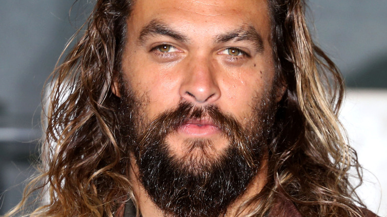 Jason Momoa looking into the camera