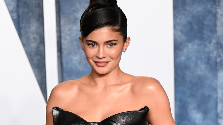 Kylie Jenner poses at an event