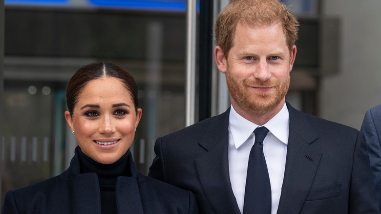 Meghan Markle and Prince Harry posing
