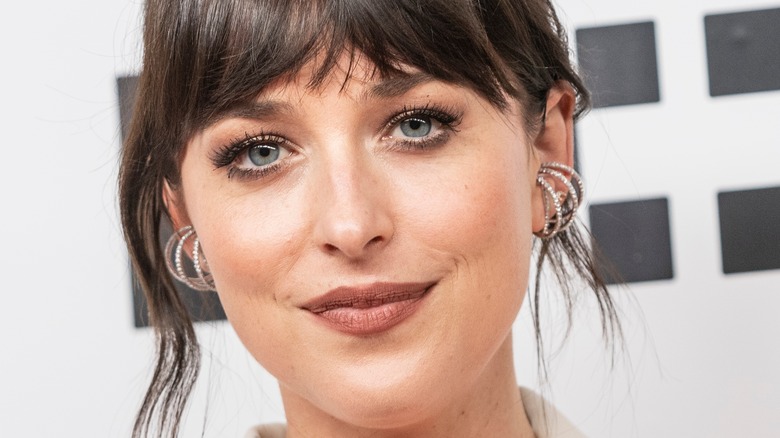 Dakota Johnson diamond hoops