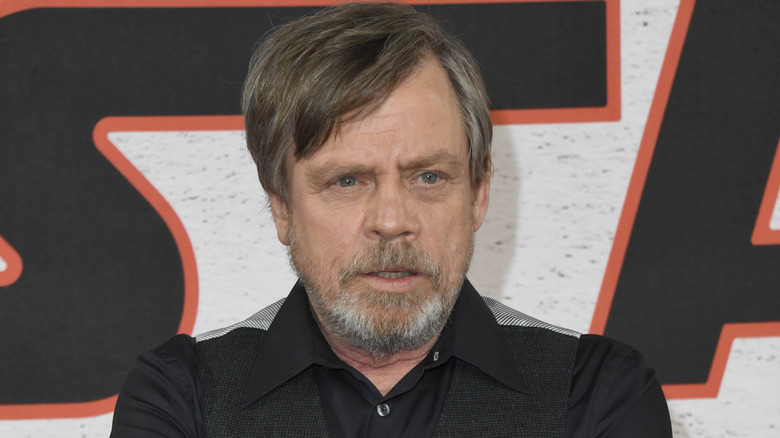 Mark Hamill posing at the 'Last Jedi' premiere