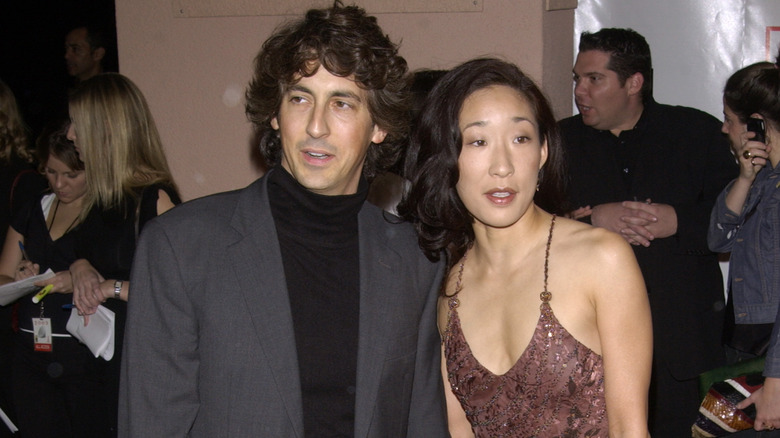 Alexander Payne and Sandra Oh in formalwear