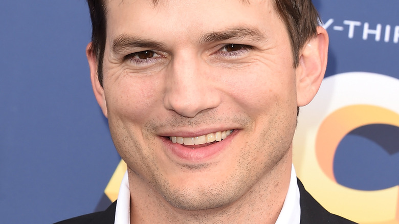 Ashton Kutcher smiling