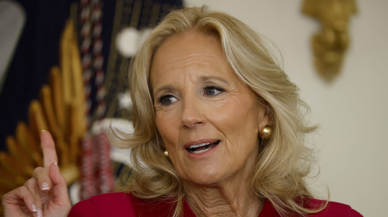 Jill Biden holding her indix finger up