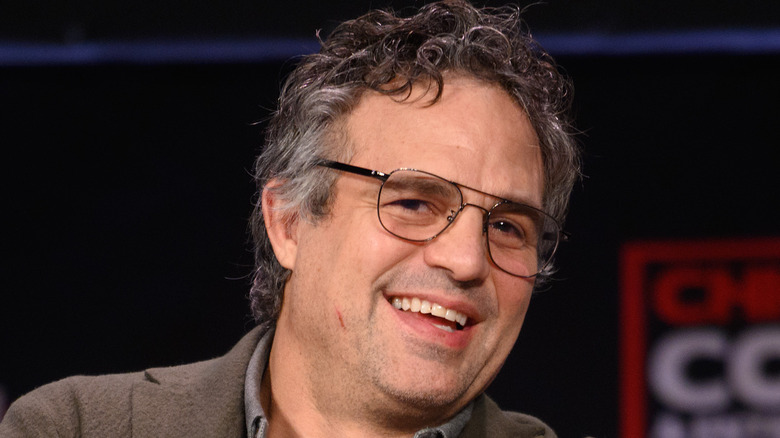 Mark Ruffalo smiling and wearing glasses