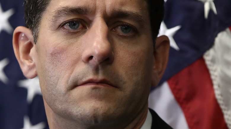 Paul Ryan in front of a U.S. flag.