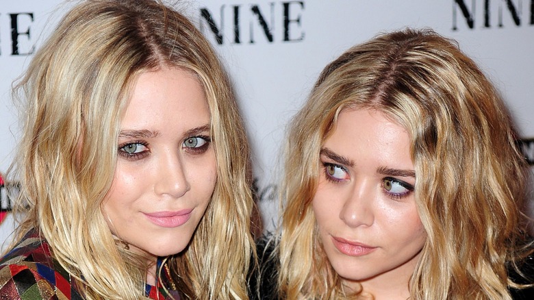Mary-Kate and Ashley Olsen smiling