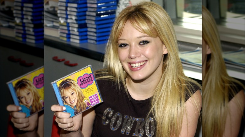 Hilary Duff is all smiles as she flaunts a "Lizzie McGuire" DVD