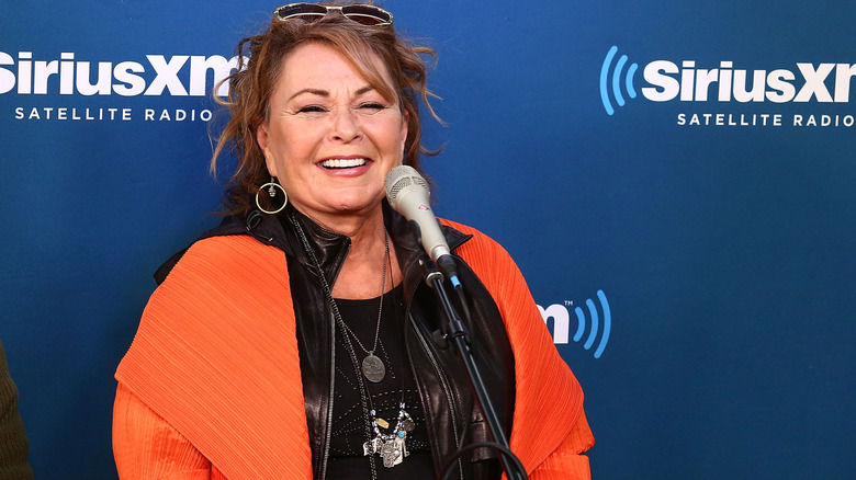 Roseanne Barr with a red coat at a Sirius XM event