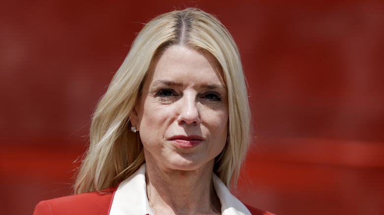 Pam Bondi posing at a press conference at Port Everglades
