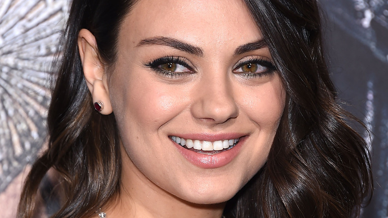 Mila Kunis smiling