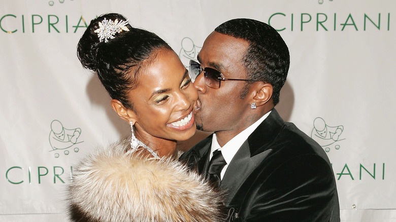 Kim Porter Sean Combs kiss