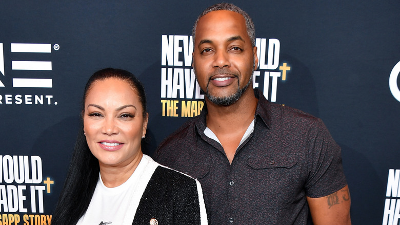 Egypt Sherrod and Mike Jackson pose in 2022