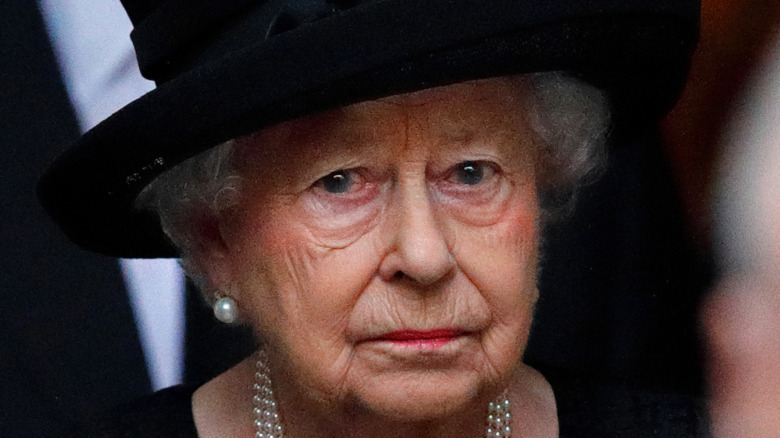 Queen Elizabeth II at a funeral