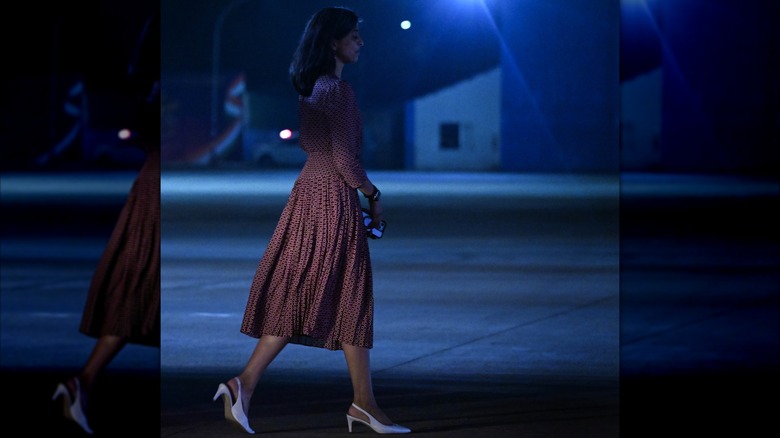 Usha Vance walking on the tarmac during her and JD's trip to India.
